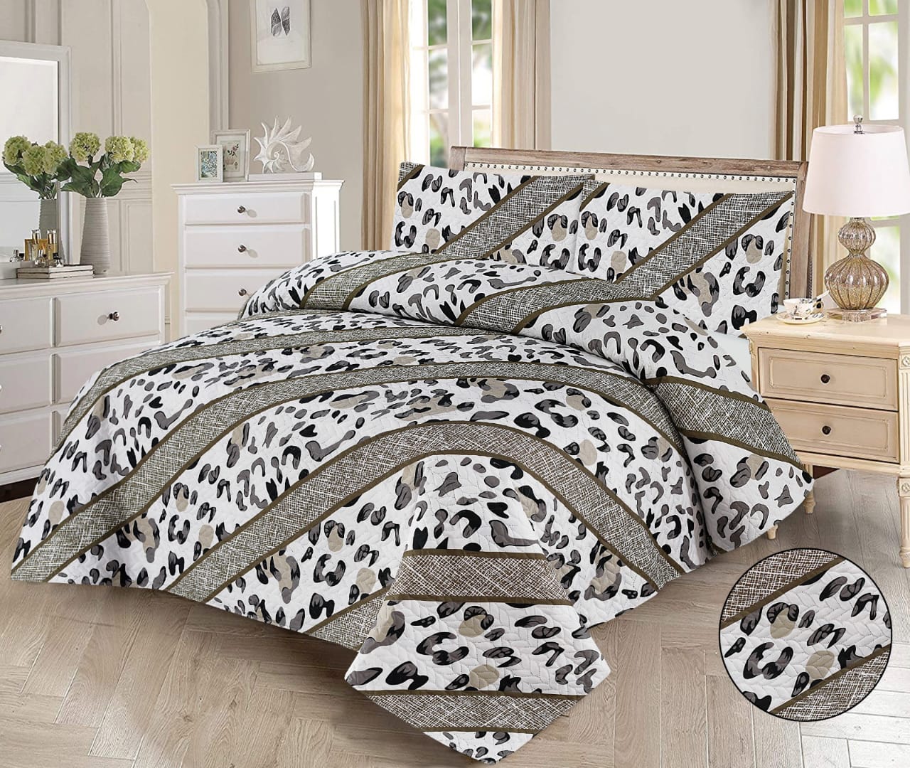 Leopard print comforter set on a bed in a bedroom setting