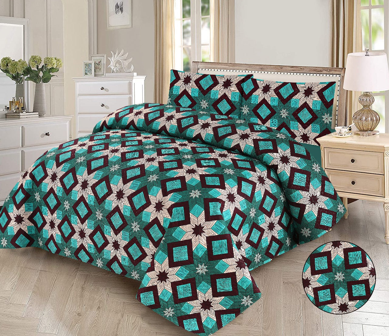 Patterned bedspread set on a bed in a bedroom with a round view of the design.